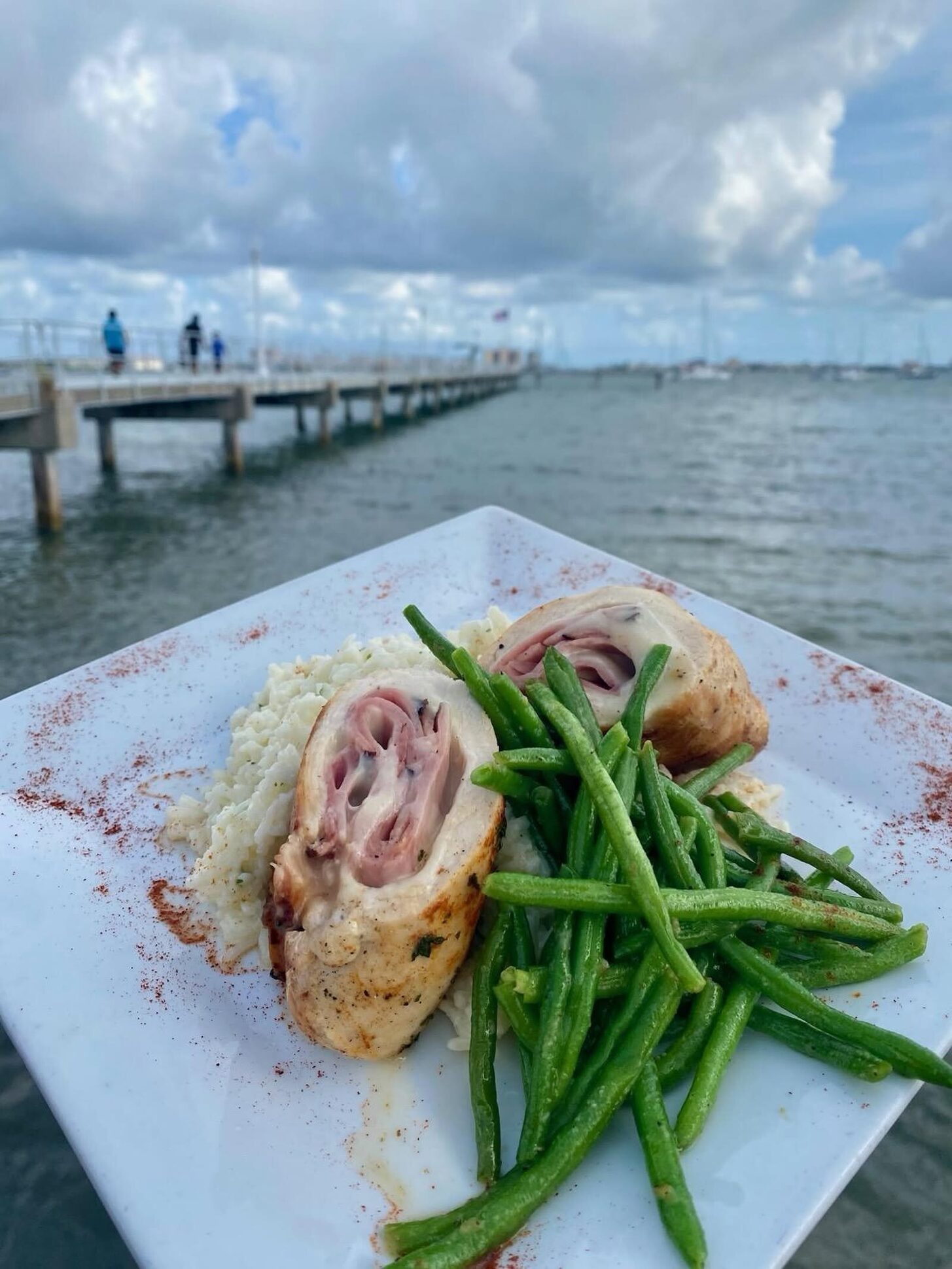 Chicken cordon bleu with the pier behind, at O'Maddy's