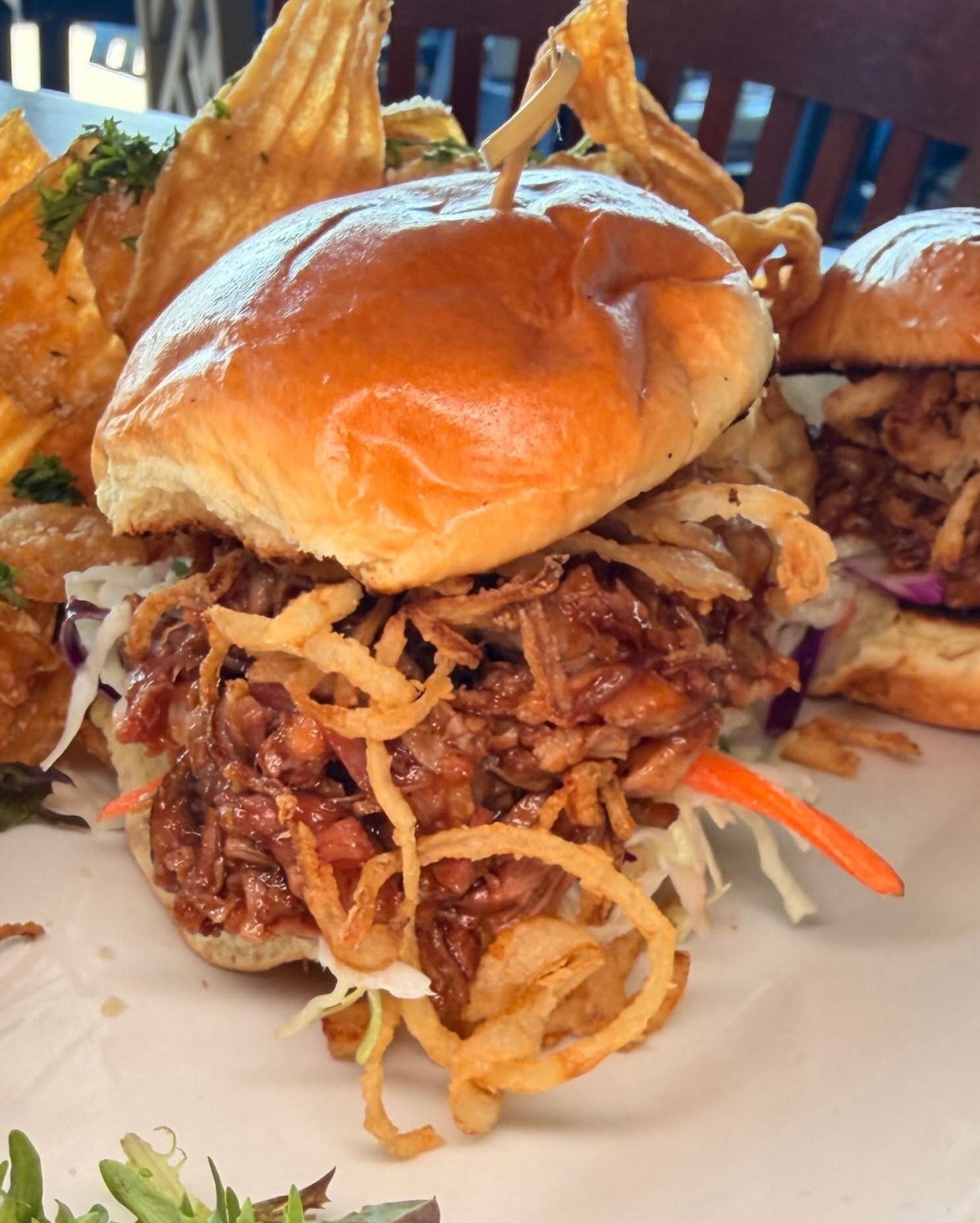 Pulled pork sliders with onion straws and chips at O’Maddy’s