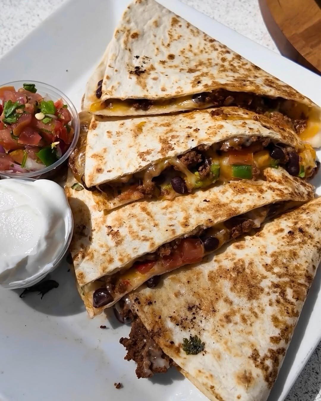 A quesadilla with pico de gallo at O’Maddy’s